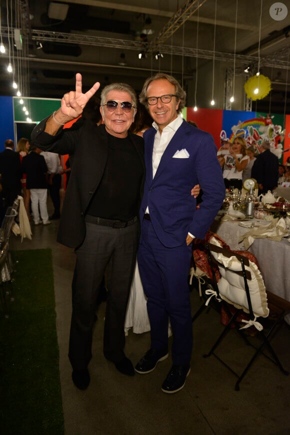 Roberto Cavalli, Andrea Della Valle lors du dîner "Convivio 2014" à Milan, le 12 juin 2014.