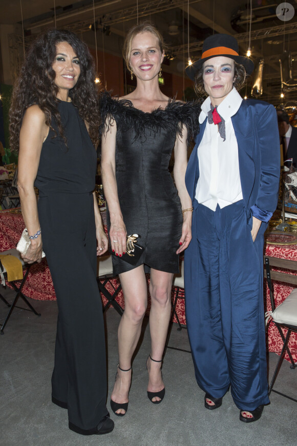 Afef Jnifen, Eva Herzigova, Stefania Rocca lors du dîner "Convivio 2014" à Milan, le 12 juin 2014.