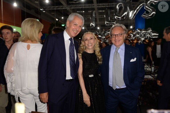 Marco Tronchetti Provera, Franca Sozzani, Diego Della Valle lors du dîner "Convivio 2014" à Milan, le 12 juin 2014.