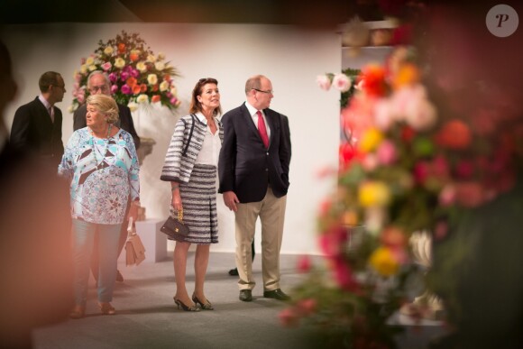 Le prince Albert II de Monaco et la princesse Caroline de Hanovre ont procédé le 14 juin 2014 à la réouverture de la Roseraie Princesse-Grace et assisté au 47e concours international de bouquets. Deux semaines après l'annonce officielle de sa grossesse, la princesse Charlene était également présente, pour baptiser une rose à son nom.