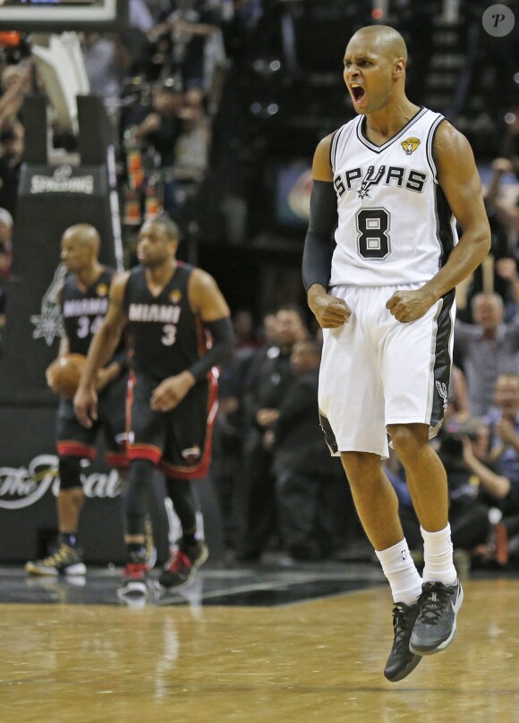 Les Spurs de San Antonio et Patty Mills ont décroché le cinquième titre NBA de leur histoire en s'imposant face au Heat de Miami (104-87), dans leur salle du AT&T Center lors du match 5 des finales, le 15 juin 2014