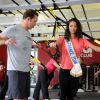 Miss France 2014, Flora Coquerel fait un entraînement de TRX suspension avec Randy Hetrick, chez CMG au Club Waou Bercy à Paris, le 17 juin 2014