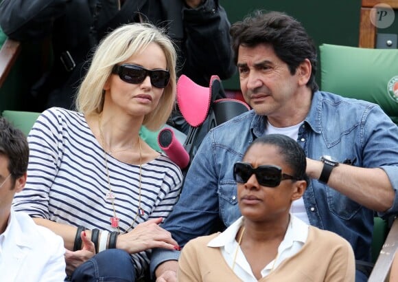 Adriana Karembeu et son compagon André Ohanian aux Internationaux de France de Roland-Garros à Paris, le 9 juin 2012.