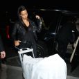 Kim Kardashian et sa fille North à l'aéroport de Los Angeles, le 24 juin 2014.