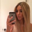 Un sein de Kim Kardashian dévoilé sur un selfie. New York, le 25 juin 2014.