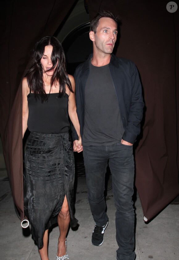 Courteney Cox et son compagnon Johnny McDaid à West Hollywood, le 25 juin 2014. 