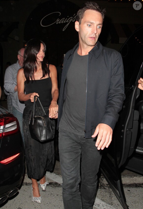 Courteney Cox et son compagnon Johnny McDaid dînent en tête-à-tête au restaurant Craig à West Hollywood, le 25 juin 2014.