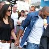 Tony Parker et sa fiancée Axelle Francine se promènent main dans la main à Saint-Tropez. Le 1er juillet 2014.