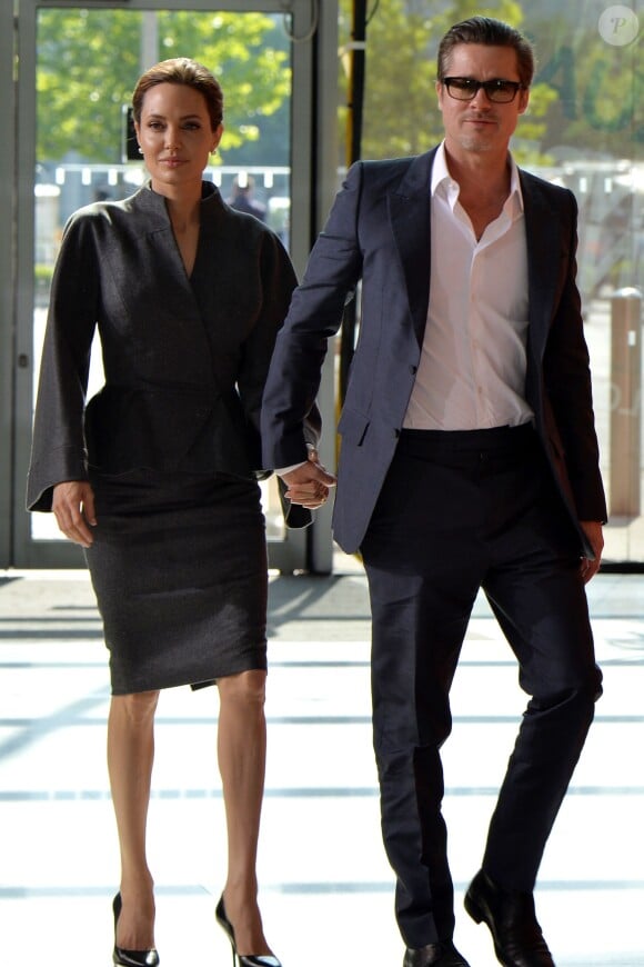 Angelina Jolie et Brad Pitt assistent à la conférence sur la prévention contre les violences sexuelles lors des conflits. Londres, le 13 juin 2014.