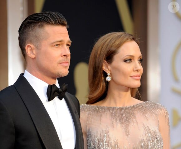 Brad Pitt et Angelina Jolie lors de la 86e cérémonie des Oscars à Hollywood, le 2 mars 2014. 