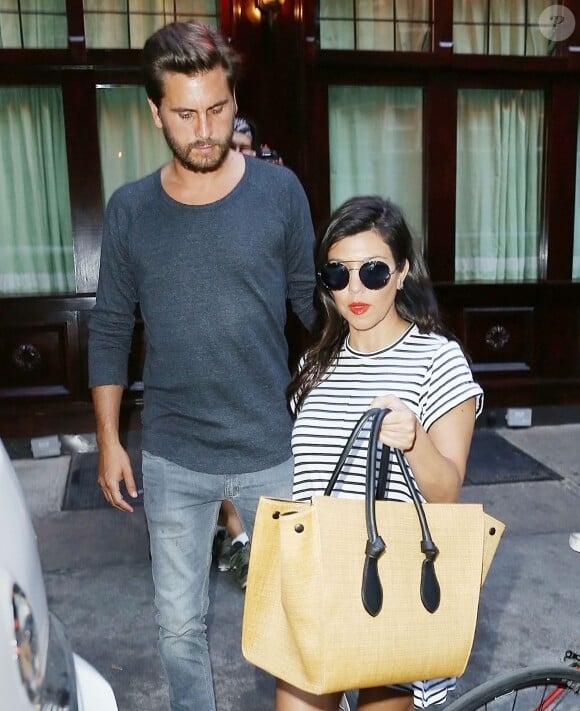 Kourtney Kardashian (enceinte) et Scott Disick à New York, le 7 juillet 2014.
