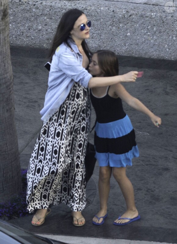 Exclusif - L'acteur David Arquette demande en mariage sa compagne Christina McLarty à Malibu le 2 juillet 2014, en présence de fille Coco et de son jeune fils Charlie.