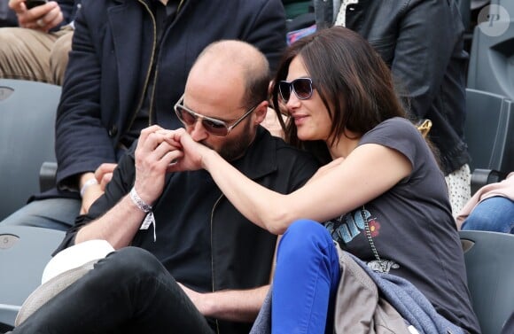 Helena Noguerra et son compagnon Fabrice De Welz assistent au tournoi de tennis de Roland-Garros à Paris, le 2 juin 2014.
