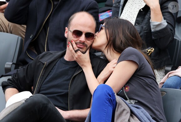 Helena Noguerra et son compagnon Fabrice De Welz assistent au tournoi de tennis de Roland-Garros à Paris, le 2 juin 2014.