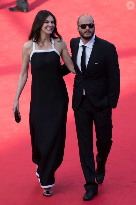 Helena Noguerra et son compagnon Fabrice Du Welz - Montée des marches du film "Sils Maria" lors du 67e Festival du film de Cannes, le 23 mai 2014.