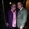 Elton John et son mari David Furnish posent lors de la fashion week Homme à Londres, le 7 janvier 2014.