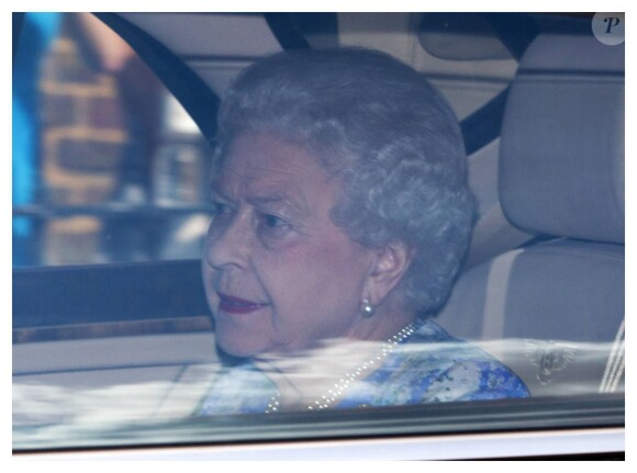 La reine Elizabeth II arrivant pour la fête du premier anniversaire du prince George de Cambridge au Palais de Kensington à Londres, le 22 juillet 2014.