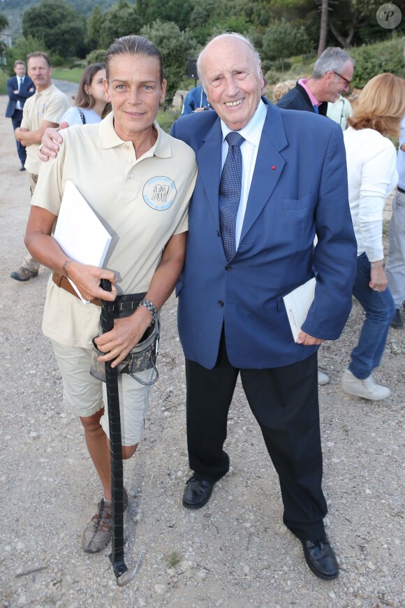 Exclusif - La princesse Stéphanie de Monaco fête le 1er anniversaire de l'arrivée des éléphantes Baby et Népal au domaine de Fontbonne sur la commune de Peille, le 12 juillet 2014. Elle pose ici avec le docteur Alain Frère, créateur avec le prince Rainier III de Monaco du festival international du cirque de Monaco.