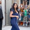 Kim Kardashian quitte un magasin Babies"R"Us après y avoir lancé la collection de vêtements pour enfants de Kardashian Kollection. New York, le 7 juillet 2014.