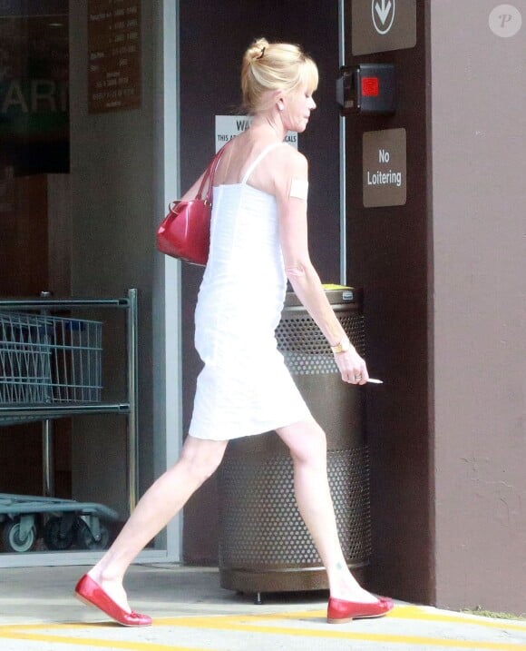 Exclusif - Melanie Griffith sort du tribunal avec sa fille Stella dont elle demande la garde. Elles vont ensuite faire du shopping à Beverly Hills, le 28 juillet 2014.