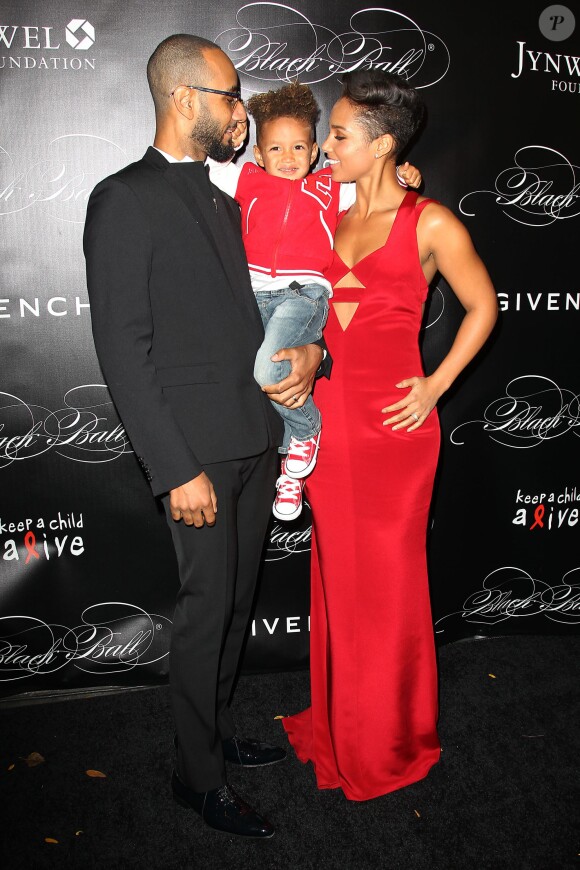 Swizz Beatz, Alicia Keys et leur fils Egypt à New York. Novembre 2013.