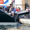 Chris Brown et ses amis font une entrée fracassante dans le port de Saint-Tropez en venant percuter le quai durant les manoeuvres d'amarrage le 30 Juillet 2014.
