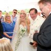 L'homme d'affaires Richard Lugner épouse sa jeune compagne Cathy Schmitz lors d'une cérémonié à Velden am Wortersee, en Autriche. Le 1 août 2014.