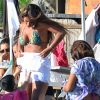 Le footballeur Lionel Messi avec son épouse Antonella et leur fils Thiago, à Sabaudia en Italie, le jeudi 31 juillet 2014.
