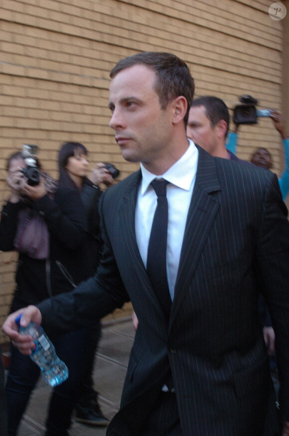 Oscar Pistorius quitte le tribunal de Pretoria, en Afrique du Sud, le 8 août 2014.