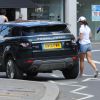 Exclusif - Pippa Middleton, visiblement pressée, rejoint son 4*4 Range Rover en courant. Londres, le 9 août 2014.