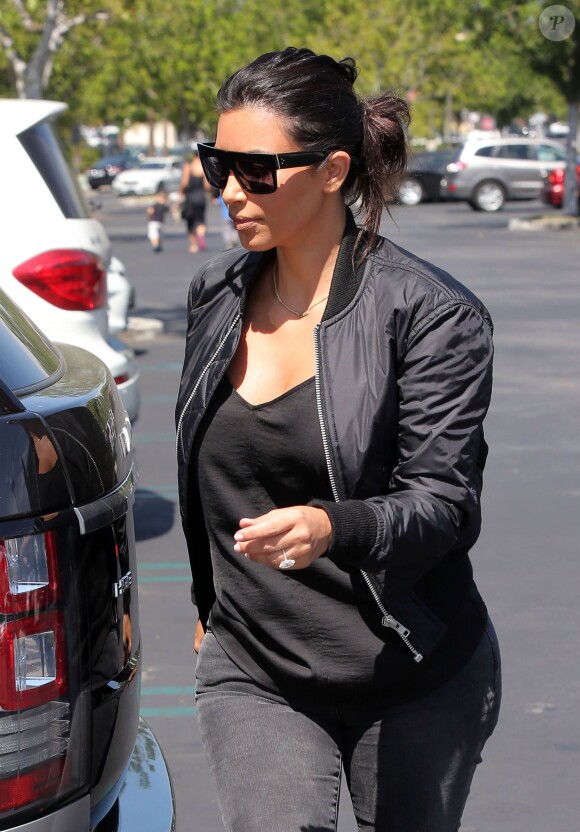 Kim Kardashian a amené son neveu Mason au cinéma à Los Angeles. Le 19 août 2014