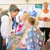La reine Silvia de Suède assiste au "Pensioners Day" à Ekerö dans le comté de Stockholm, le 27 août 2014.