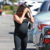 Mila Kunis enceinte à la sortie de son cours de yoga à Los Angeles, le 28 août 2014.