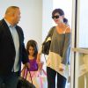 Katie Holmes et Suri Cruise au JFK Airport à New York le 23 juillet 2014.