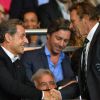 Nicolas Sarkozy et Roland Romeyer lors du match entre le Paris Saint-Germain et l'AS Saint-Etienne, au Parc des Princes à Paris le 31 août 2014