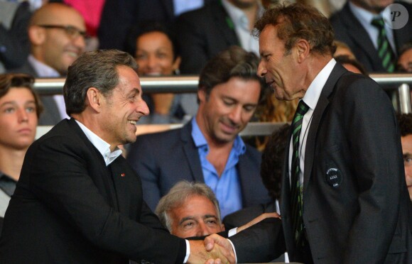Nicolas Sarkozy et Roland Romeyer lors du match entre le Paris Saint-Germain et l'AS Saint-Etienne, au Parc des Princes à Paris le 31 août 2014