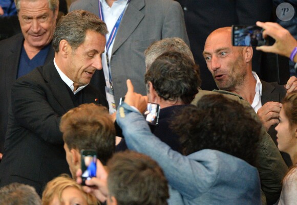 Nicolas Sarkozy lors du match entre le Paris Saint-Germain et l'AS Saint-Etienne, au Parc des Princes à Paris le 31 août 2014