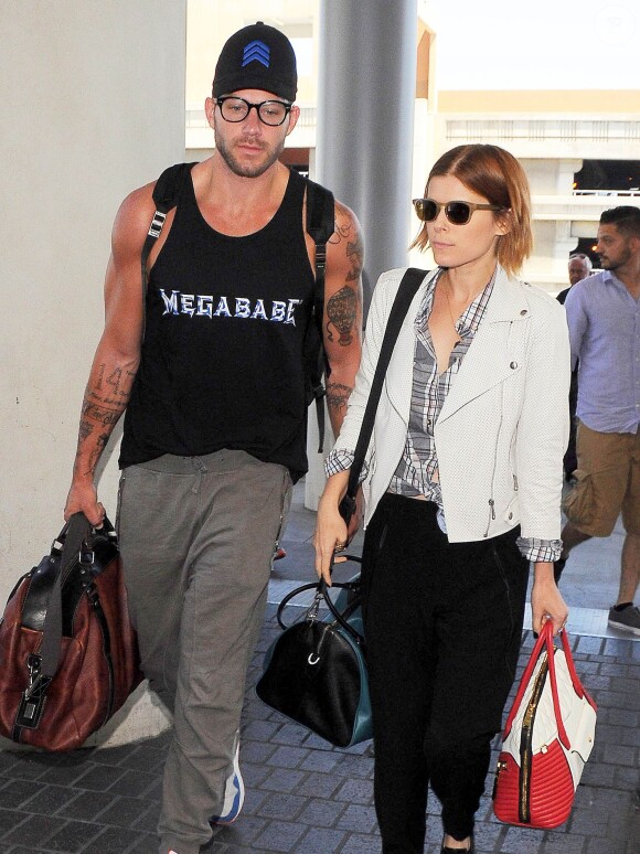 Kate Mara et Johnny Wujek à Los Angeles, partant pour Venise et la Mostra, le 26 août 2014