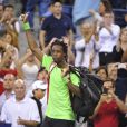Gaël Monfilslors lors de son quart de finale face à Roger Federer à l'US Open, à l'USTA Billie Jean King National Tennis Center de New York, le 4 septembre 2014