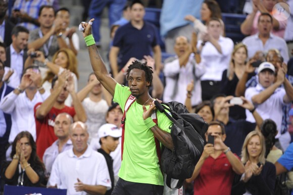 Gaël Monfilslors lors de son quart de finale face à Roger Federer à l'US Open, à l'USTA Billie Jean King National Tennis Center de New York, le 4 septembre 2014