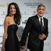 George Clooney et sa belle Amal Alamuddin sur le tapis rouge de la Celebrity Fight Night qui se tenait au Palazzo Vecchio de Florence, le 7 septembre 2014
