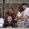 Tony Parker et Thierry Henry avec leurs amoureuses respectives Axelle Francine et Andrea Rajacic devant la finale de l'US Open à New York le 8 septembre 2014. 