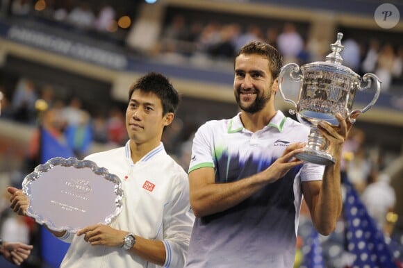 Marin Cilic et Kei Nishikori après la finale de l'US Open à New York le 8 septembre 2014. 