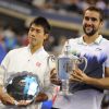 Marin Cilic et Kei Nishikori après la finale de l'US Open à New York le 8 septembre 2014. 