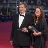 John McTiernan avec sa femme arrivant à son hommage lors du 40e festival du cinéma américain de Deauville le 8 septembre 2014