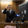 Oscar Pistorius lors de son arrivée à la North Gauteng High Cour de Pretoria, le 1er juillet 2014, où il doit répondre du meurtre de Reeva Steenkamp