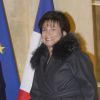 Anne Sinclair tout sourire et Pierre Nora arrivent au Palais de l'Elysée à Paris le 9 decembre 2013. L'historien a été élevé, par François Hollande, au grade de grand officier de la Légion d'honneur. 