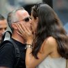 Eros Ramazzotti et son épouse Marica Pellegrinelli dans les rues de Milano, le 11 septembre 2014.