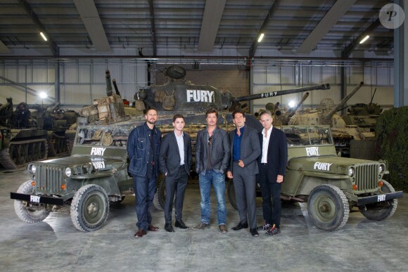 David Ayer, Logan Lerman, Brad Pitt, Jon Bernthal, et Bill Block pendant un photocall pour le film Fury au Tank Museum, Bovington, Dorset, le 28 août 2014.