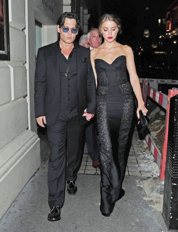 Amber Heard et Johnny Depp à Londres, le 3 septembre 2014. 